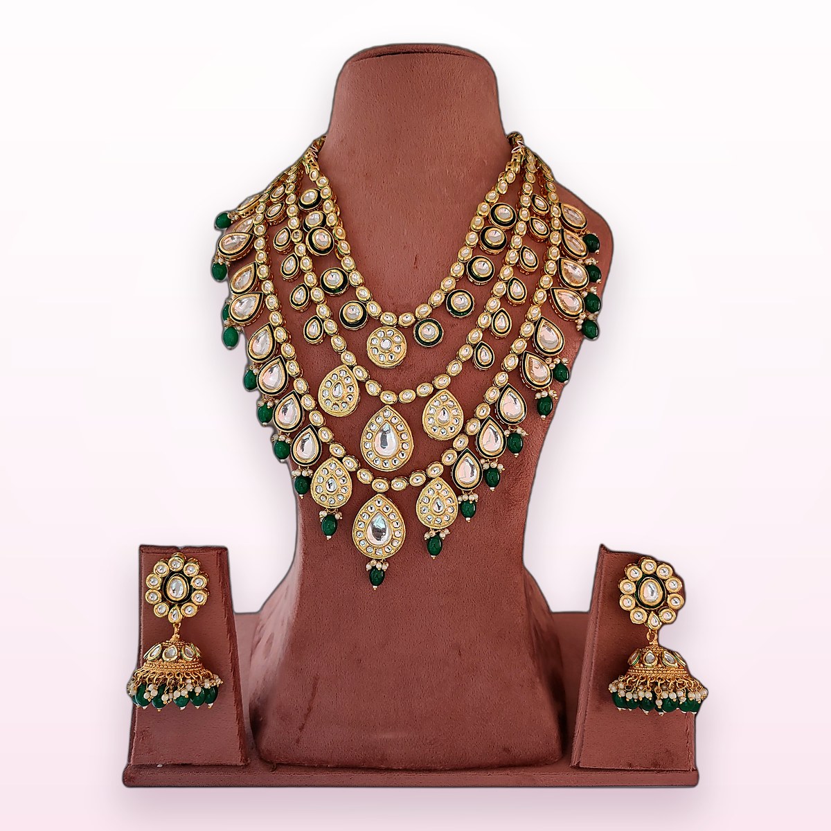 Emerald Kundan Rani Haar on a display bust at KAMYA Makeup Studio & Academy