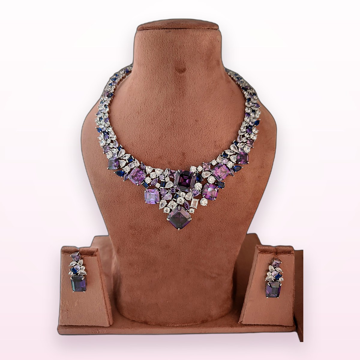 Amethyst Crystal Necklace on a display bust at KAMYA Makeup Studio & Academy
