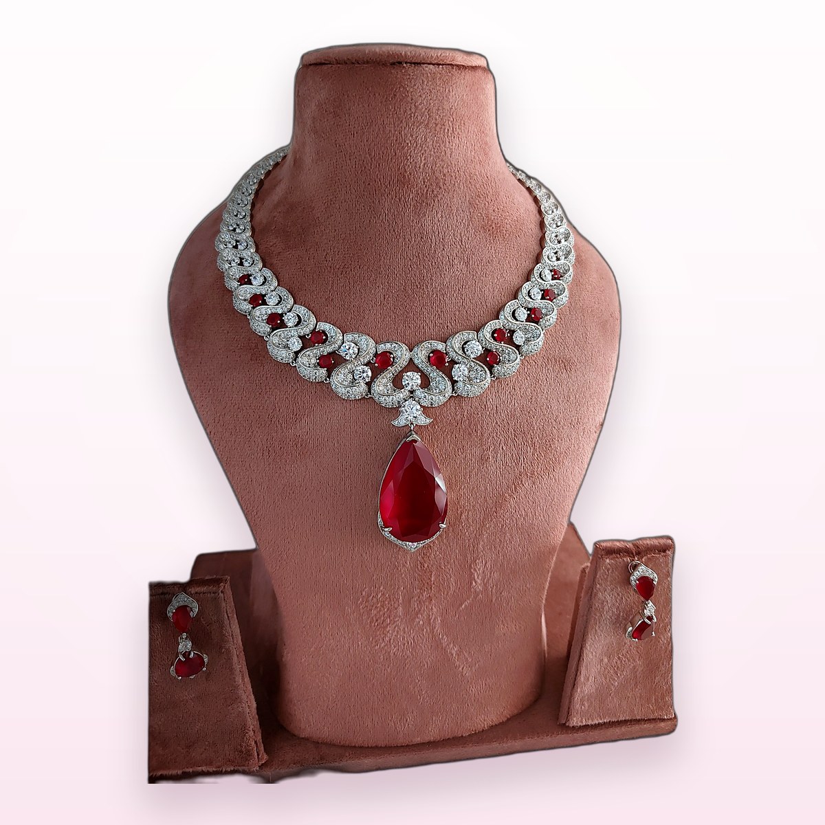 Ruby Teardrop Collar on a display bust at KAMYA Makeup Studio & Academy