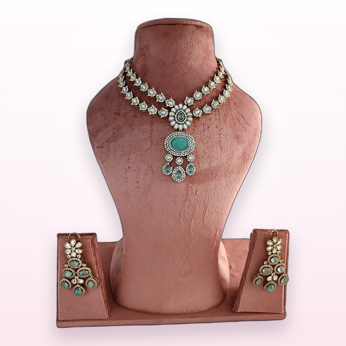 Mint Polki Necklace on a display bust at KAMYA Makeup Studio & Academy