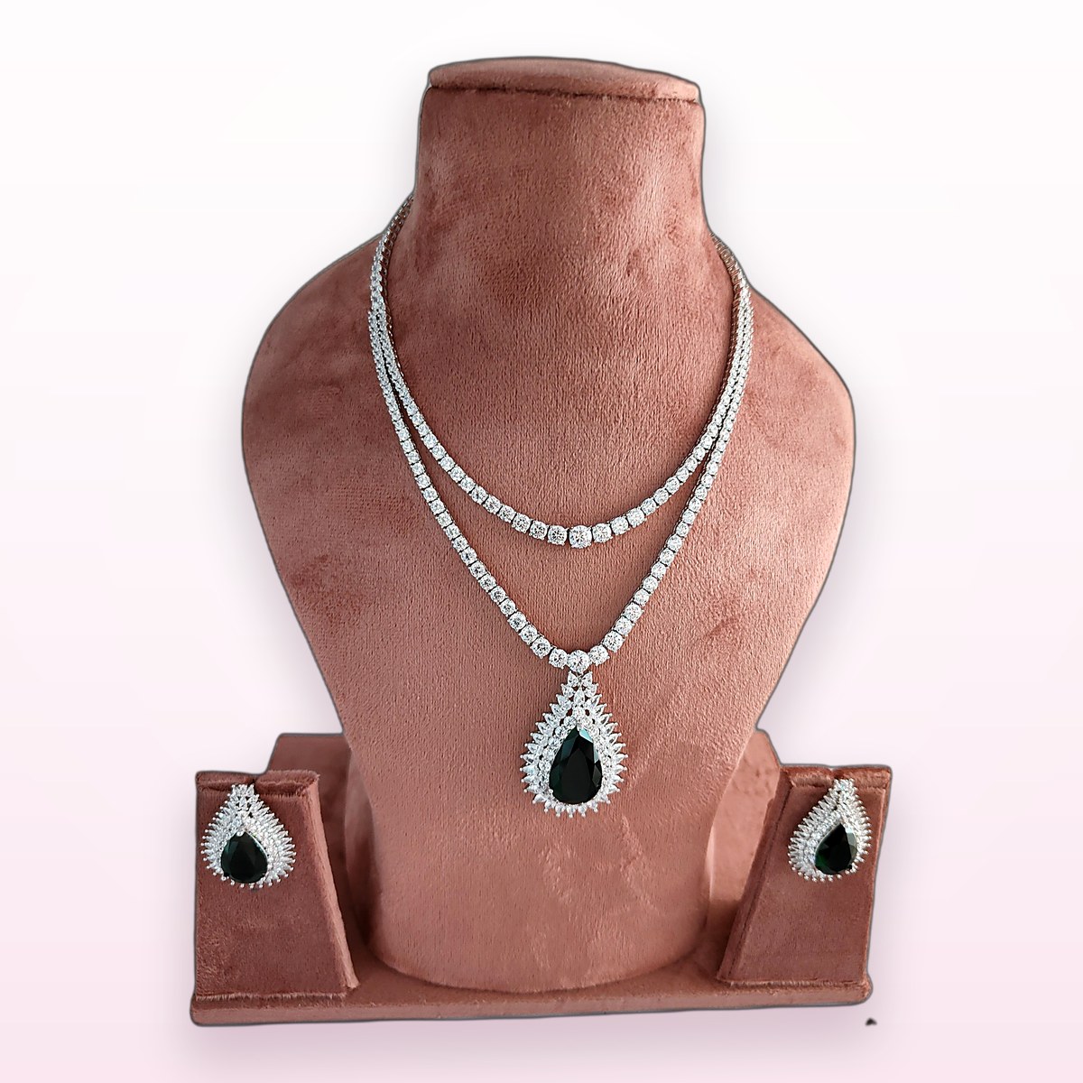Onyx Teardrop Necklace on a display bust at KAMYA Makeup Studio & Academy